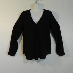 Sheer v-neck, banded buttoned long sleeve, single pleat front and back, blouse